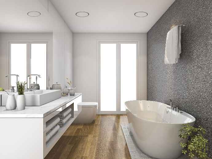 Elegant bathroom with round plaster-in seamless vents