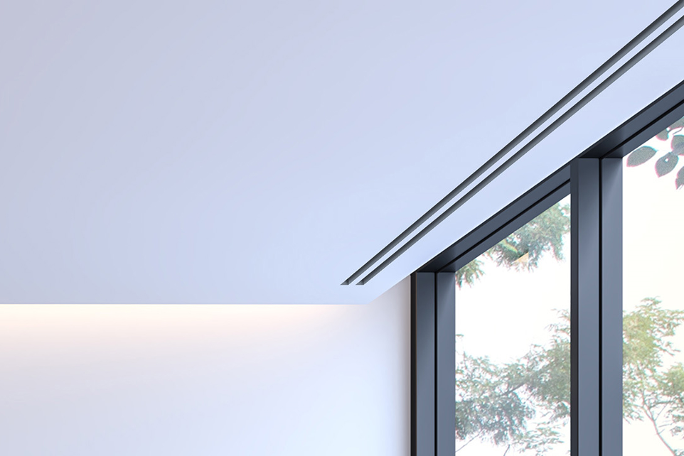 Photo showing seamless linear slot diffuser next to window